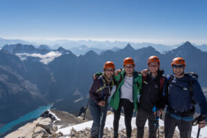 Friends at the top of Mount Temple